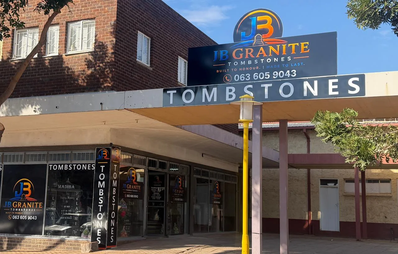 JB Granite Tombstones showroom facade with the main sign above the entrance